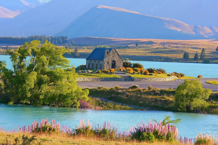 Explore the stunning landscapes of Lake Tekapo featuring the historic Church of Good Shepherd amidst a backdrop of turquoise waters and majestic mountains perfect for unforgettable memories.
